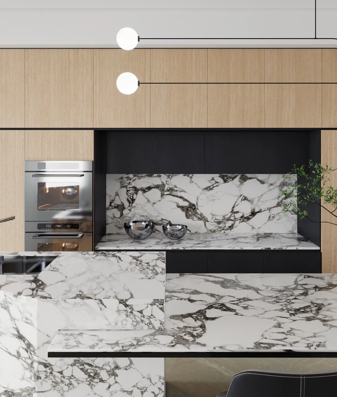 Large format white marble look sintered stone kitchen countertop and wall application with black veining