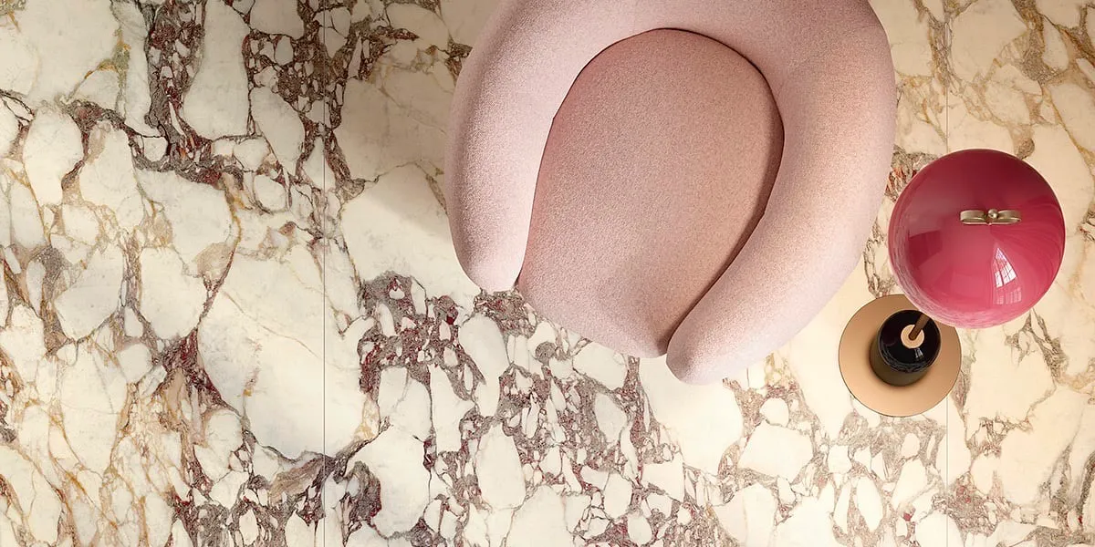 Satin white sintered stone flooring for high traffic interior areas with purple marble veining