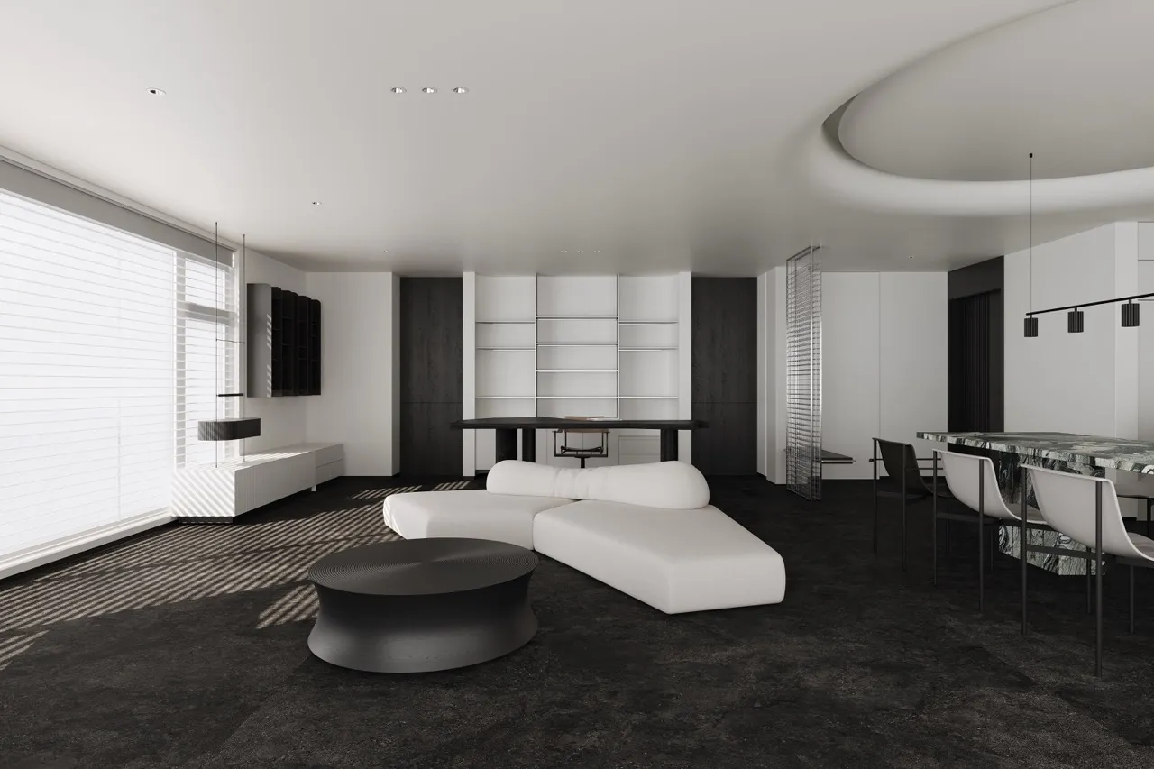 Open-plan living space with black limestone look sintered stone flooring