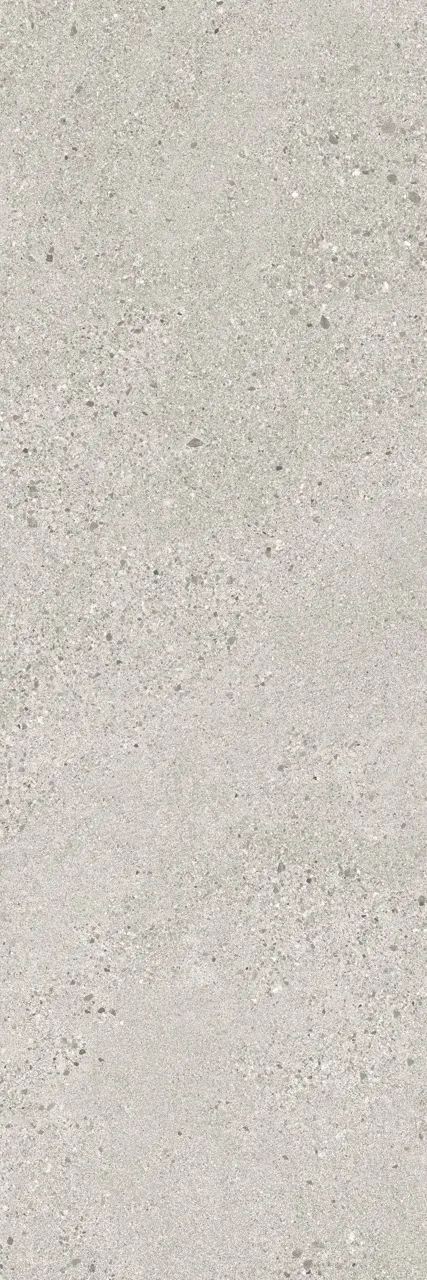 Close-up view of light gray terrazzo look sintered stone slab with fine aggregate detailing and matte glazed surface.