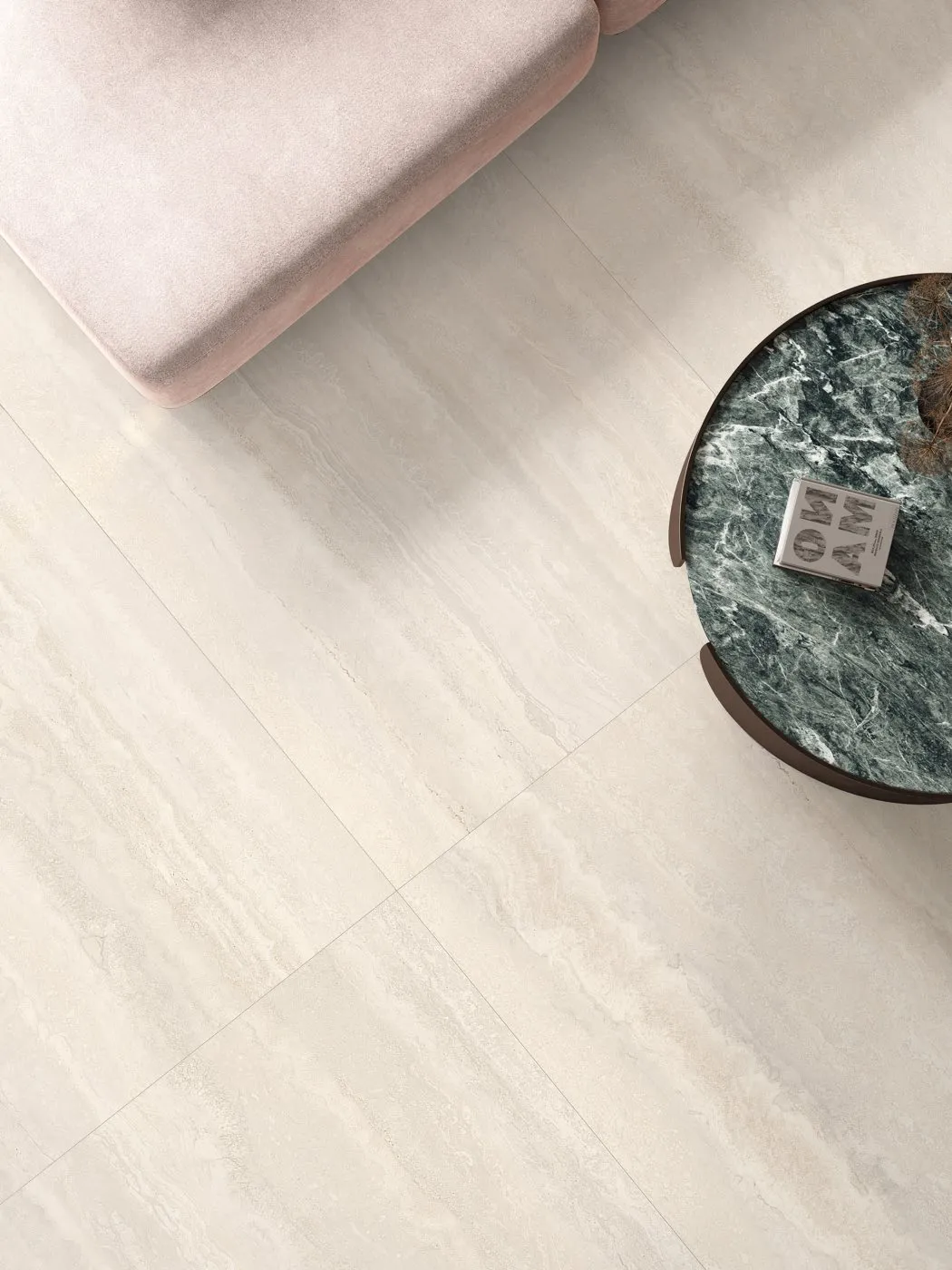 Beige travertine porcelain floor tile OSL301ST612 in a living room lounge area, 600x1200mm rectangle with soft textured stone look.