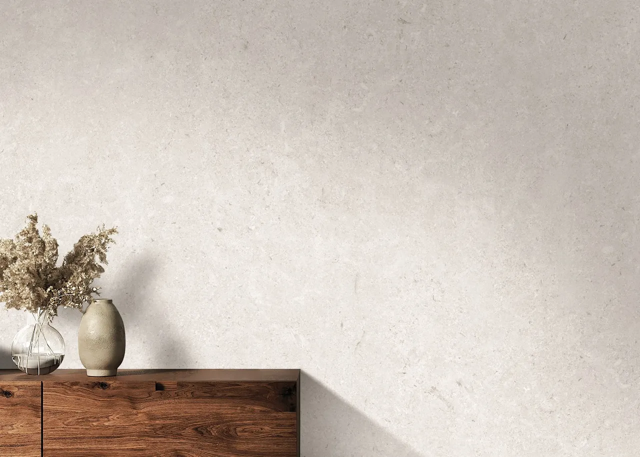 ivory white limestone look sintered stone wall cladding in contemporary interior