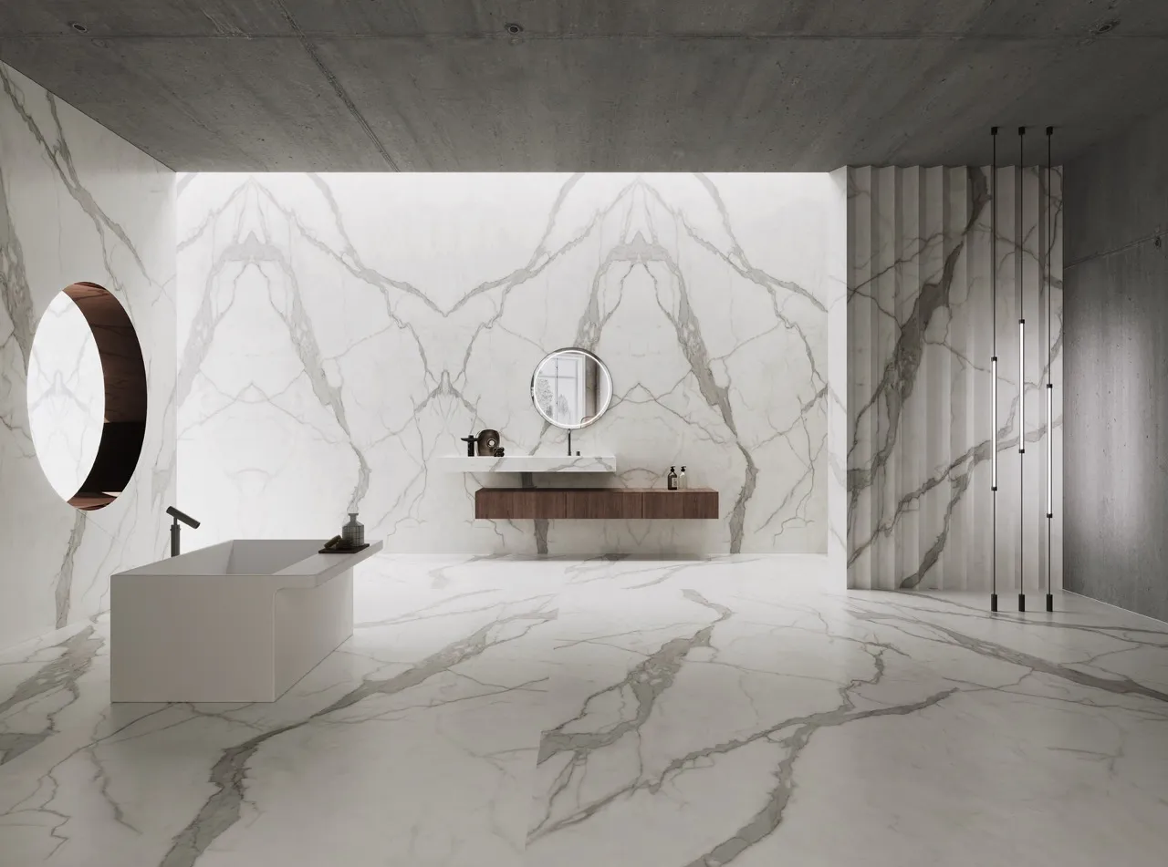 White marble look sintered stone bathroom wall and floor application with bookmatched design