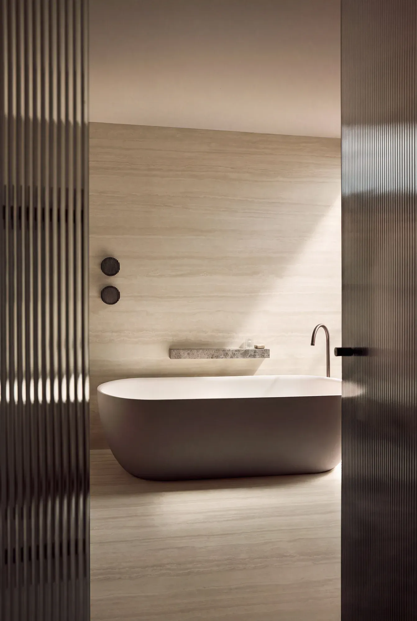 Ivory Yellow Cave beige yellow sintered stone used in a bathroom wall and floor