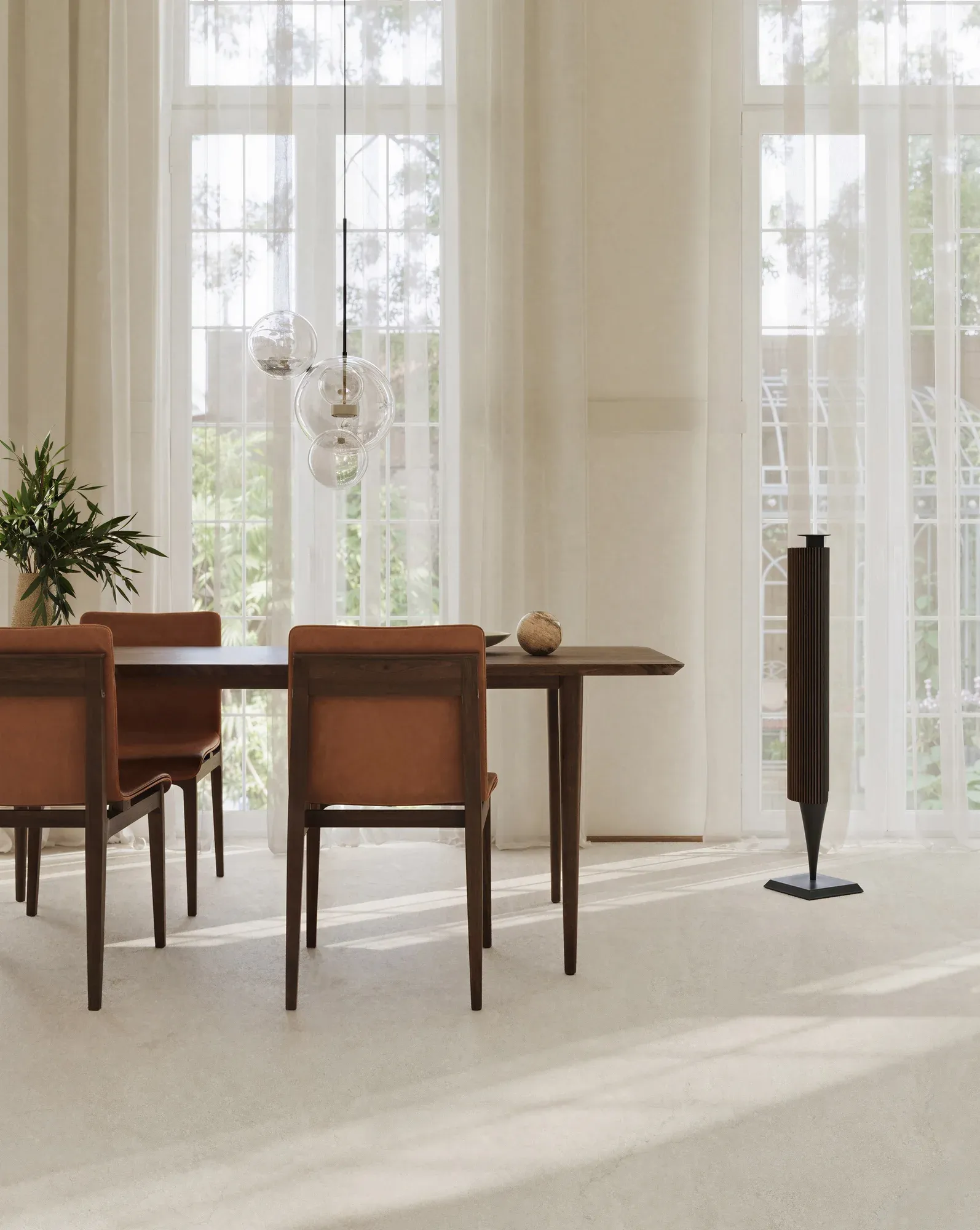 Portland White ivory white sintered stone used in a sunlit dining room floor