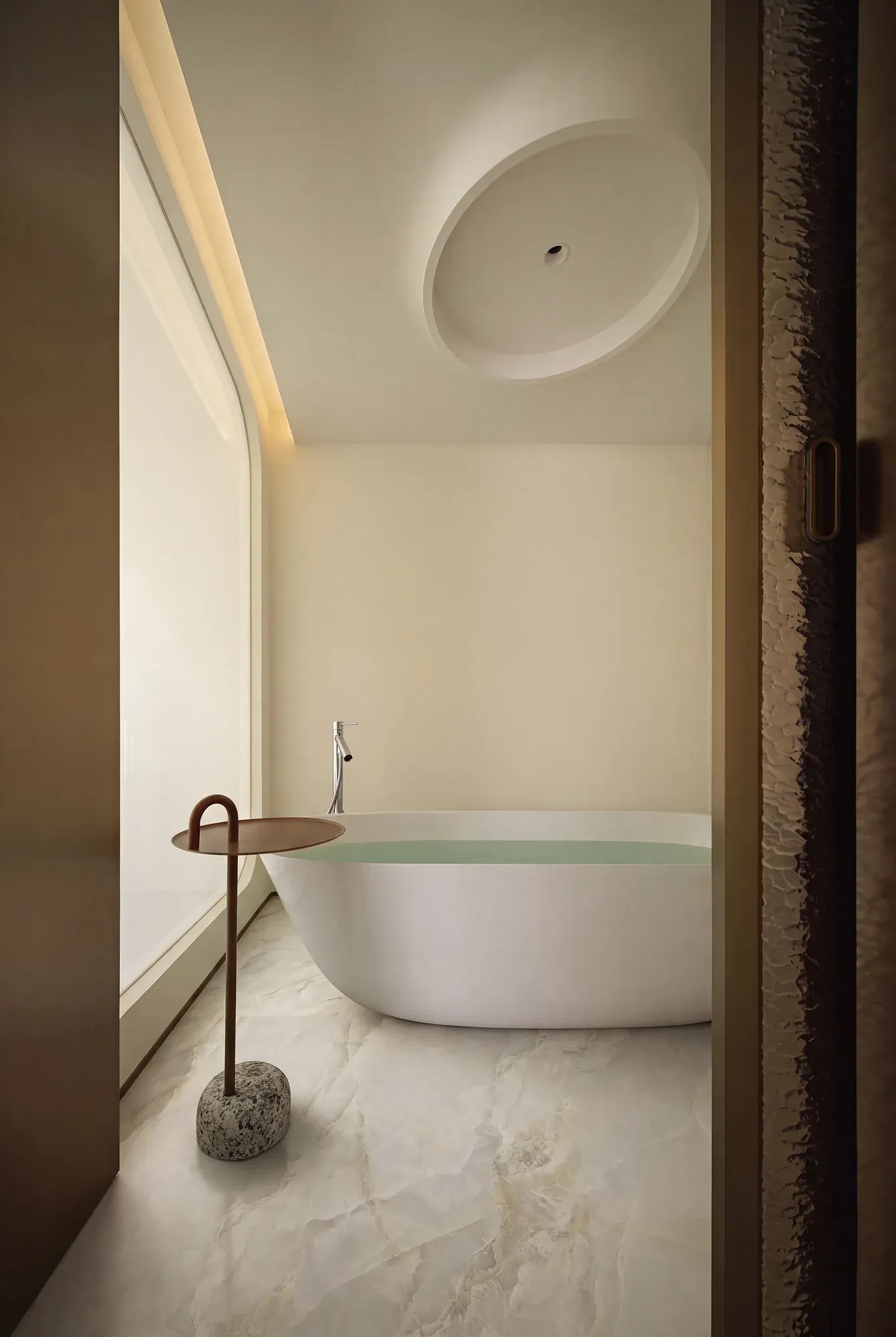 Raphael Jade Beige beige sintered stone used in a bathroom floor