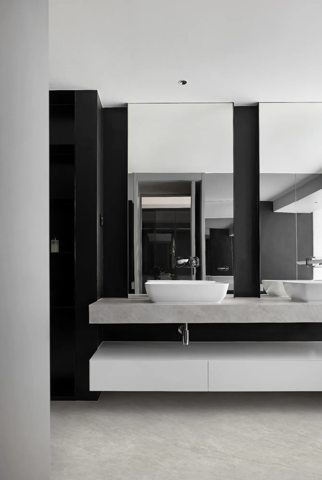Taj Mahal gray white sintered stone used in a bathroom vanity floor